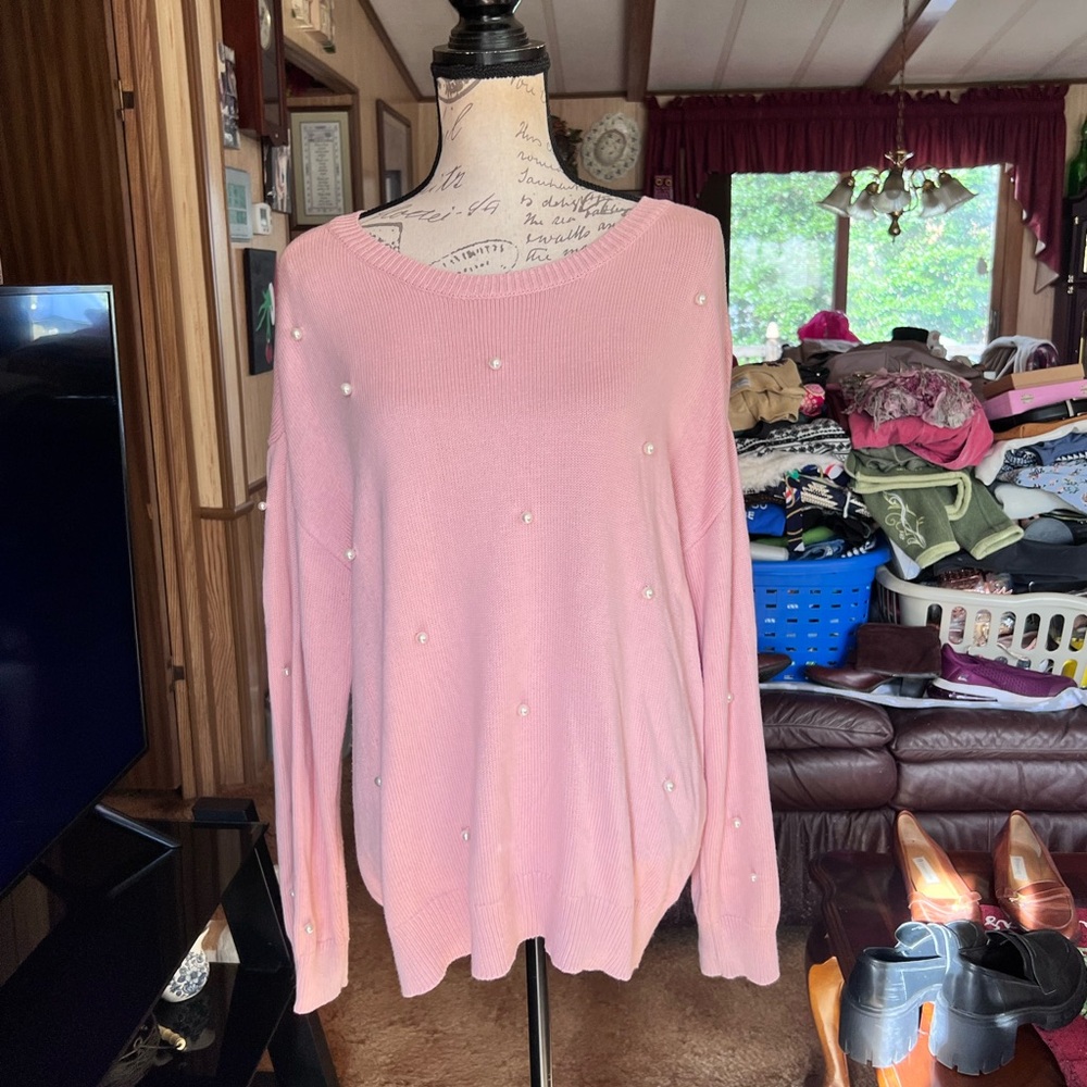 Women’s St. John's Bay pink sweater with faux pearl embellishments.
